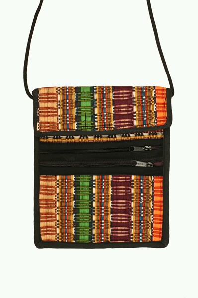 Kolorowa, materiałowa torebka na ramię z dwoma zamkami błyskawicznymi z przodu.