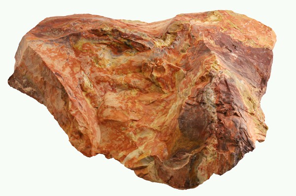 Duży kamień o nieregularnym kształcie, w odcieniach brązu, pomarańczowego i żółtego.