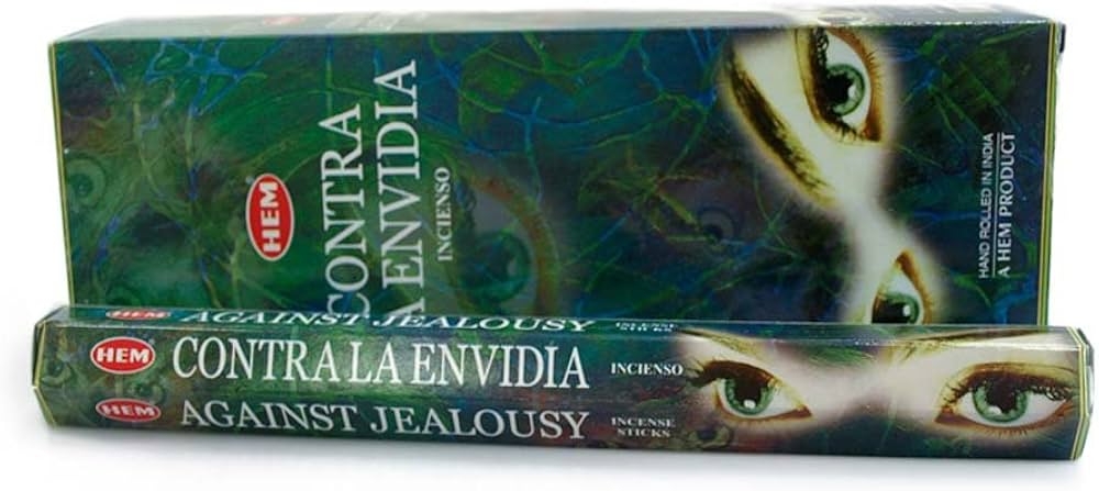 Opakowanie kadzidełek HEM z napisem „Against Jealousy” i ilustracją zielonych oczu.