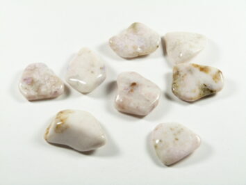 Kamień tanzanit preria. Polerowane kamienie Tanzanitu Preria w odcieniach różu i bieli